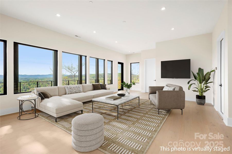 Spacious family room on terrace level (virtually staged)