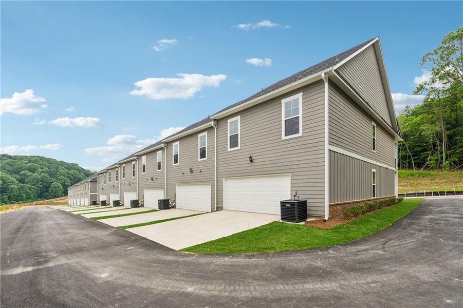 Front exterior of a new home in , Gainesville, GA, highlighting curb appeal (Image 31). Front exterior of a new home in , Gainesville, GA, highlighting curb appeal (Image 31).