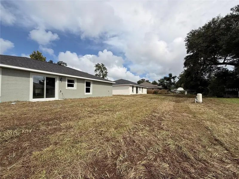Exterior details and patio area of a home in , Summerfield (Image 3).