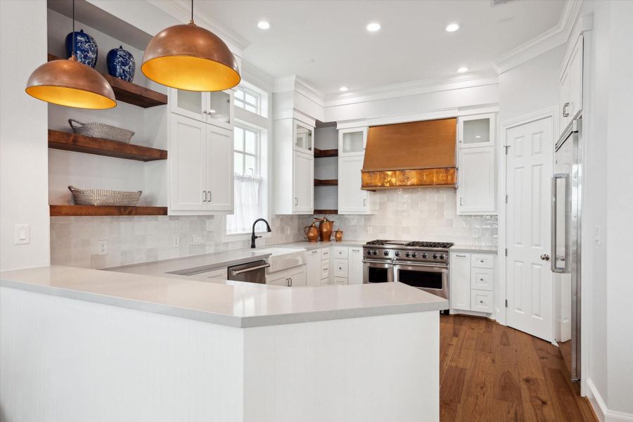 Beautiful kitchen with custom cabinetry. Plenty of storage with designer finishes.
