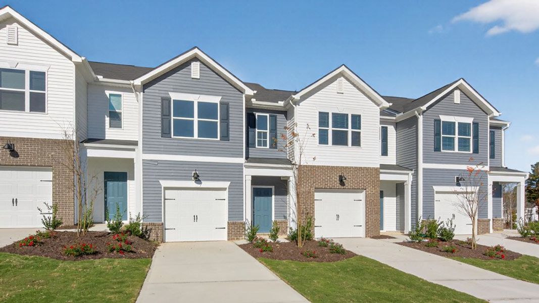 Representative exterior photo of a completed home built from the MAYWOOD by D.R. Horton in The Townes at Galvins Ridge, Sanford, NC (Image 14).