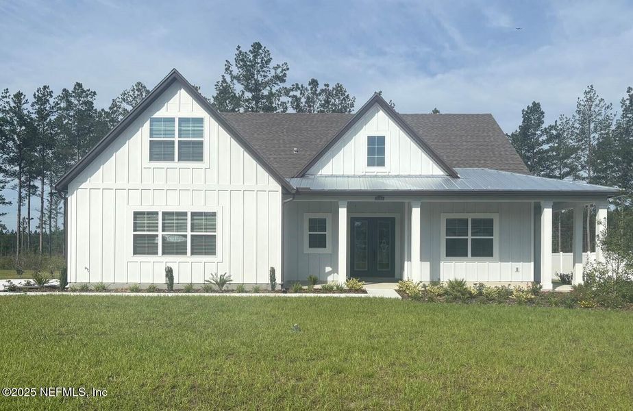 Front exterior of a new home in , Hilliard, FL, highlighting curb appeal (Image 1). Front exterior of a new home in , Hilliard, FL, highlighting curb appeal (Image 1).