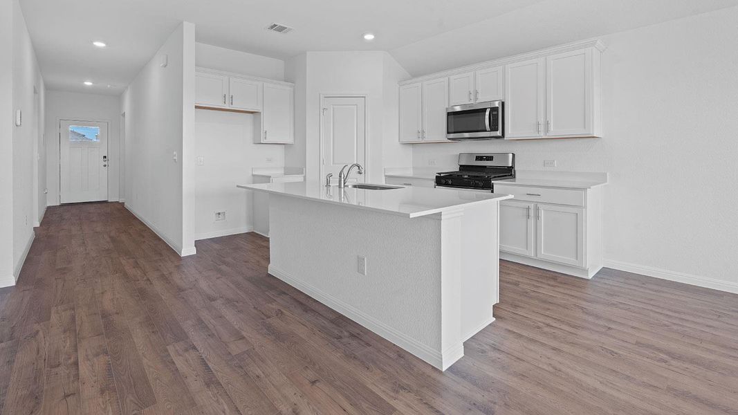 Furnished interior view inside a new home in Prairie Lakes, Buda (Image 6).