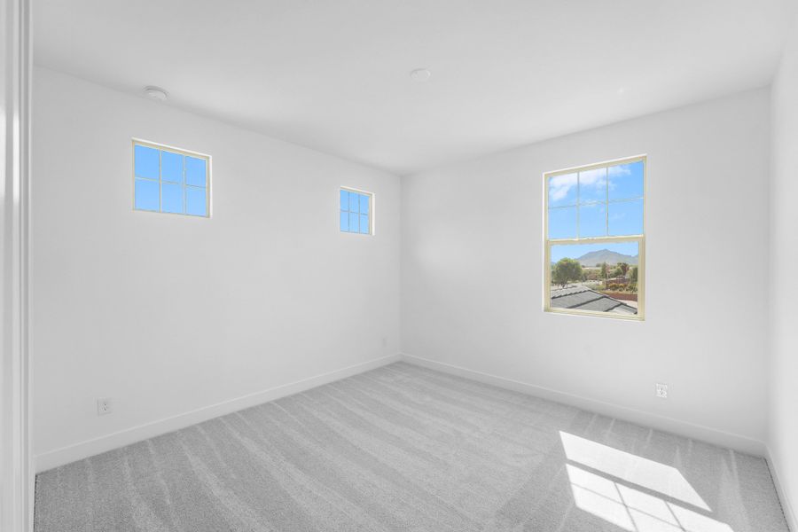 Spacious, unfurnished interior of a new home in Ellsworth Ranch Voyage Collection, Queen Creek (Image 20).