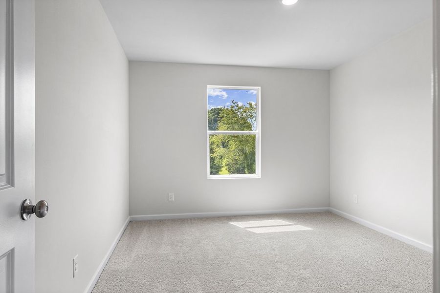 A room with a window and a door. A room with a window and a door.