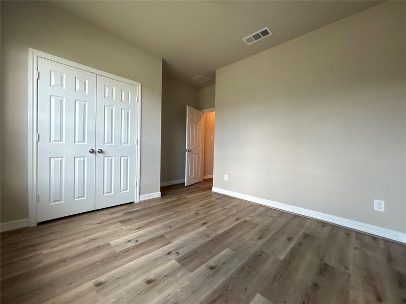 Spacious, unfurnished interior of a new home in Sunterra, Katy (Image 19).