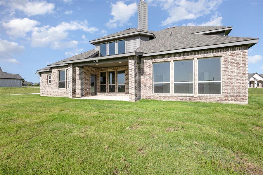 Front exterior of a new home in , Waxahachie, TX, highlighting curb appeal (Image 21).