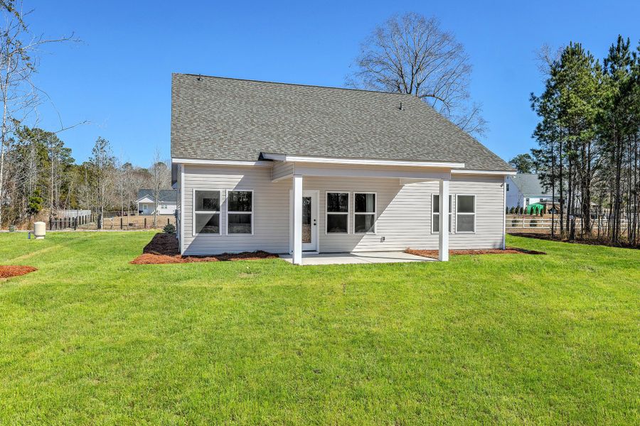 Exterior details and patio area of a home in , Holly Hill (Image 3).