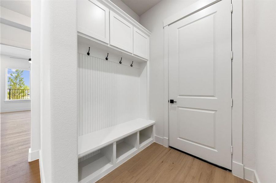 A dedicated drop zone for the kiddos backpacks and sporting equipment is located just inside the family entrance.