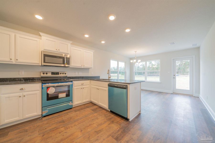 Furnished interior view inside a new home in Allison Acres, Cantonment (Image 5).