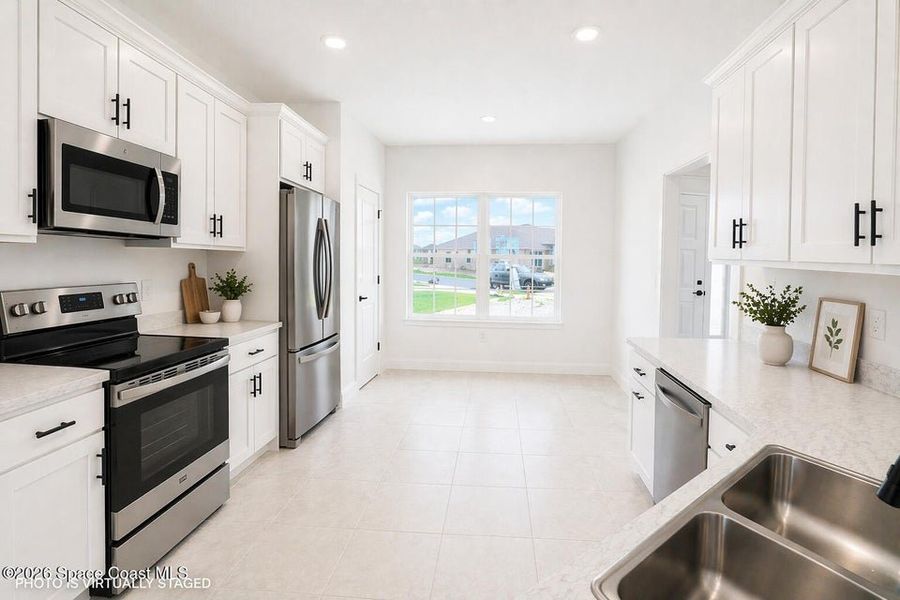 Furnished interior view inside a new home in St. John's Preserve, Palm Bay (Image 10).