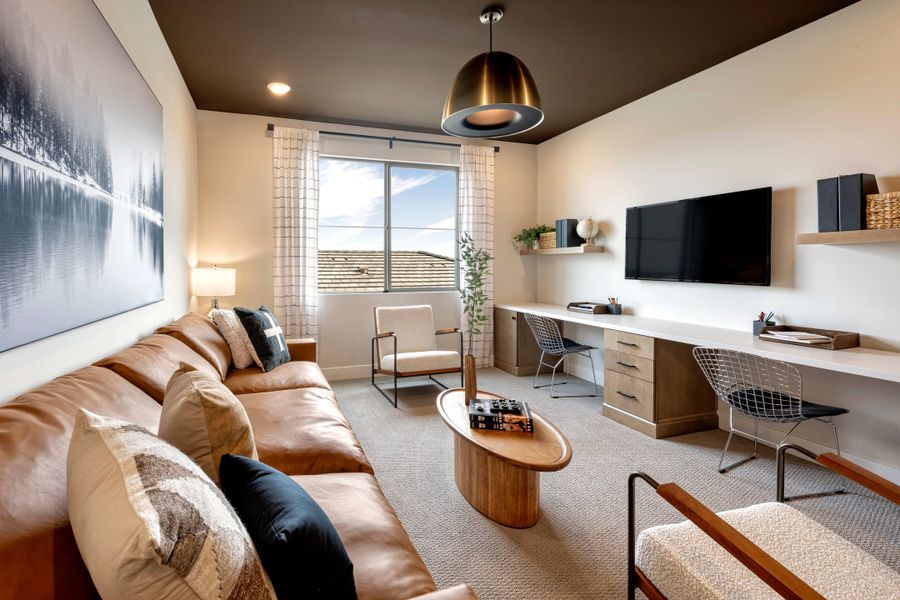 Representative furnished interior of a home built from the Willow Plan 40-9 by Tri Pointe Homes in Waterston Central, Gilbert (Image 12).