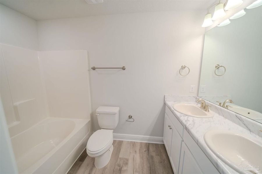 Representative furnished interior of a home built from the Plan 1542 Townhome by Adams Homes in Lexlee Estates, Pensacola (Image 6). Representative furnished interior of a home built from the Plan 1542 Townhome by Adams Homes in Lexlee Estates, Pensacola (Image 6).