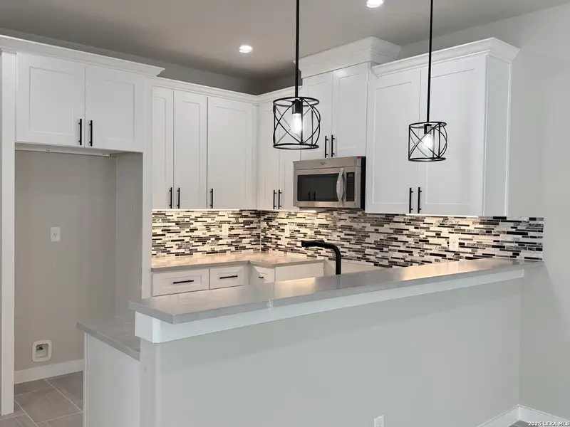 Furnished interior view inside a new home in , San Antonio (Image 7).