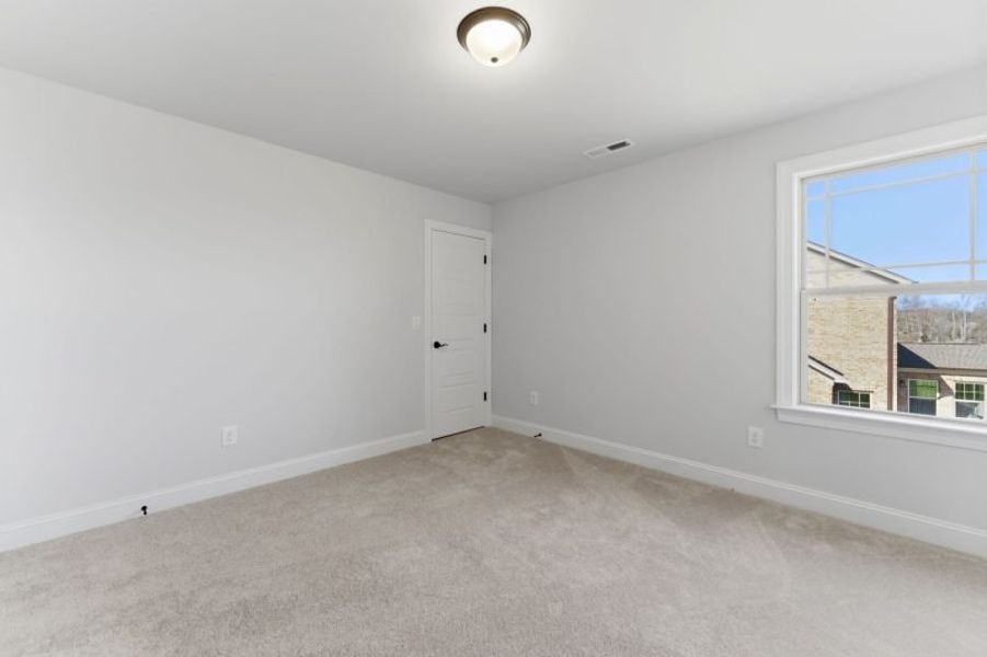 Spacious, unfurnished interior of a new home in Blacksmith, Stokesdale (Image 83).