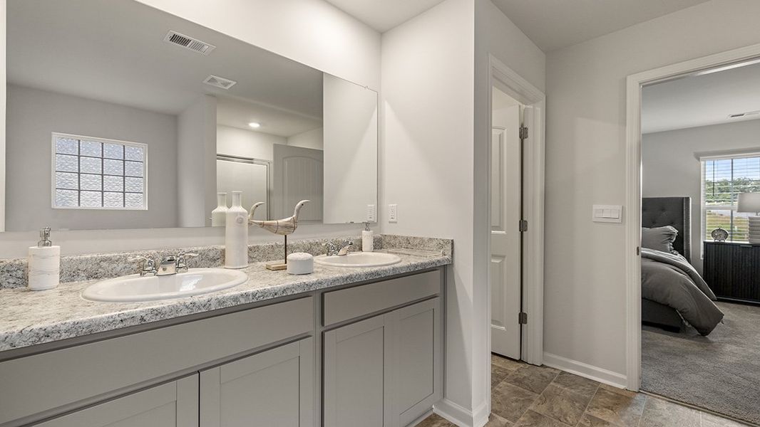Representative furnished interior of a home built from the ROBIE by D.R. Horton in Pointe Park, Union City (Image 25).
