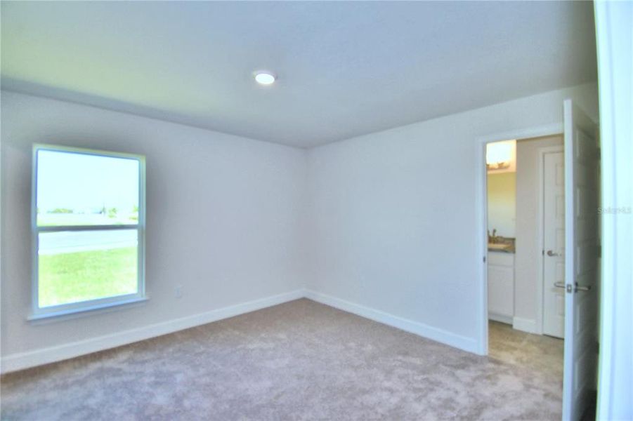 Spacious, unfurnished interior of a new home in Cadence Crossing, Auburndale (Image 30).