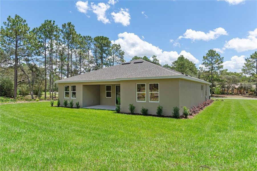 Exterior details and patio area of a home in Pine Ridge Estates, Beverly Hills (Image 29).
