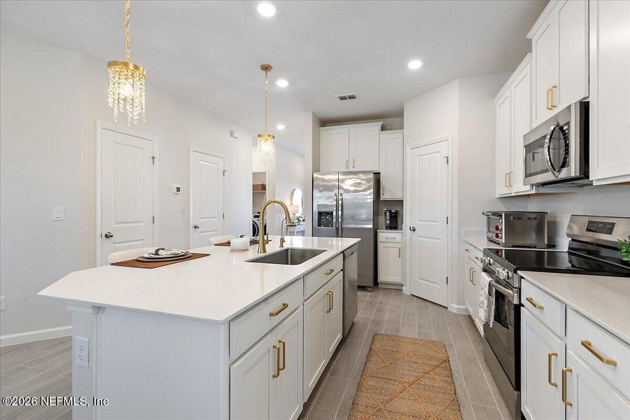 Furnished interior view inside a new home in Edenbrooke at Hyland Trail | 55+, Green Cove Springs (Image 12).