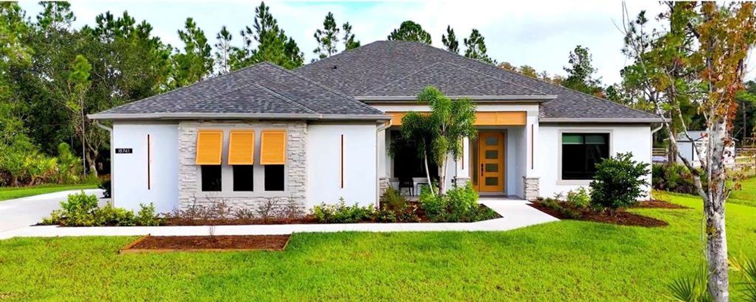 Front exterior of a new home in , Orlando, FL, highlighting curb appeal (Image 1). Front exterior of a new home in , Orlando, FL, highlighting curb appeal (Image 1).