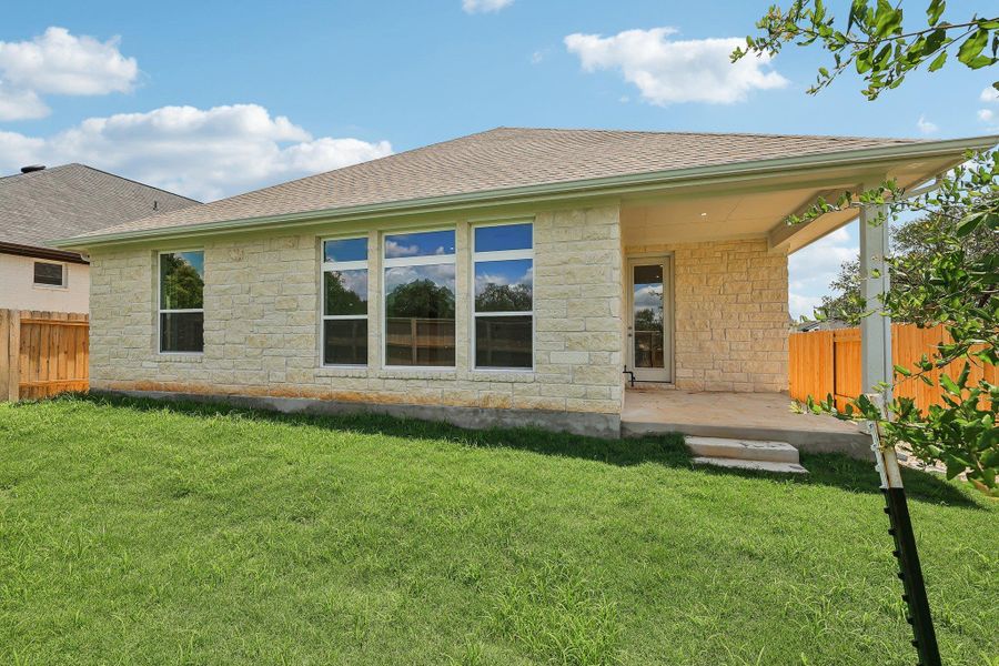 Exterior details and patio area of a home in Persimmon, Buda (Image 3). Exterior details and patio area of a home in Persimmon, Buda (Image 3).