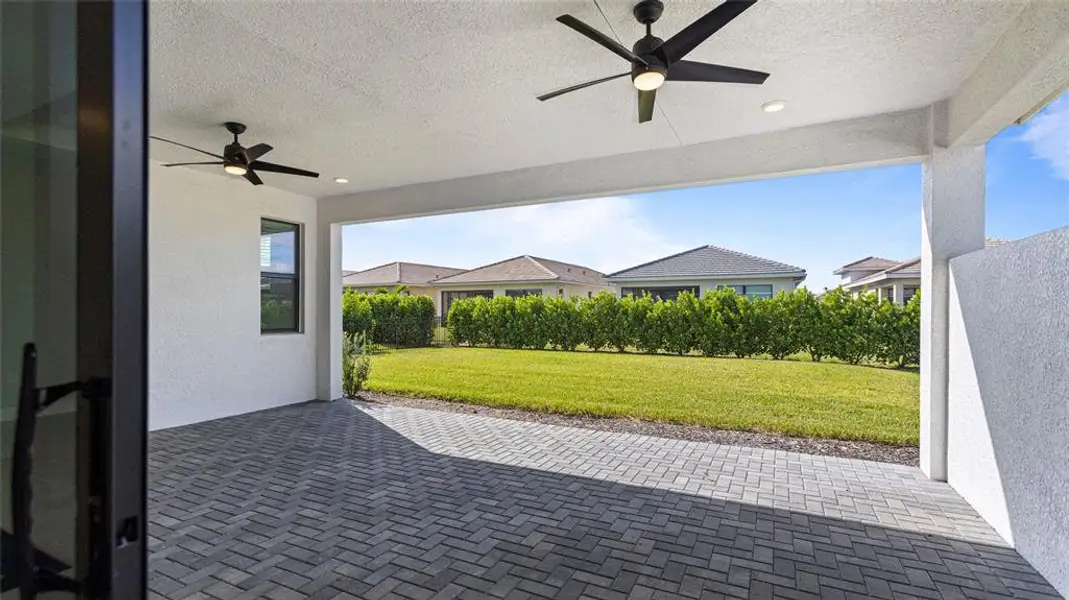 Exterior details and patio area of a home in Cresswind Lakewood Ranch, Lakewood Ranch (Image 21).