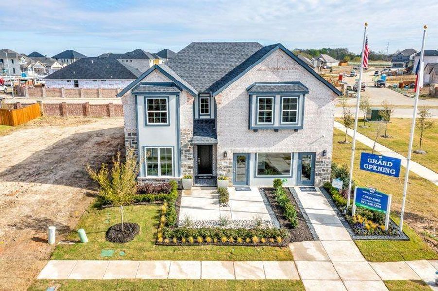 Front exterior of a new home in Creekside, Royse City, TX, highlighting curb appeal (Image 2). Front exterior of a new home in Creekside, Royse City, TX, highlighting curb appeal (Image 2).