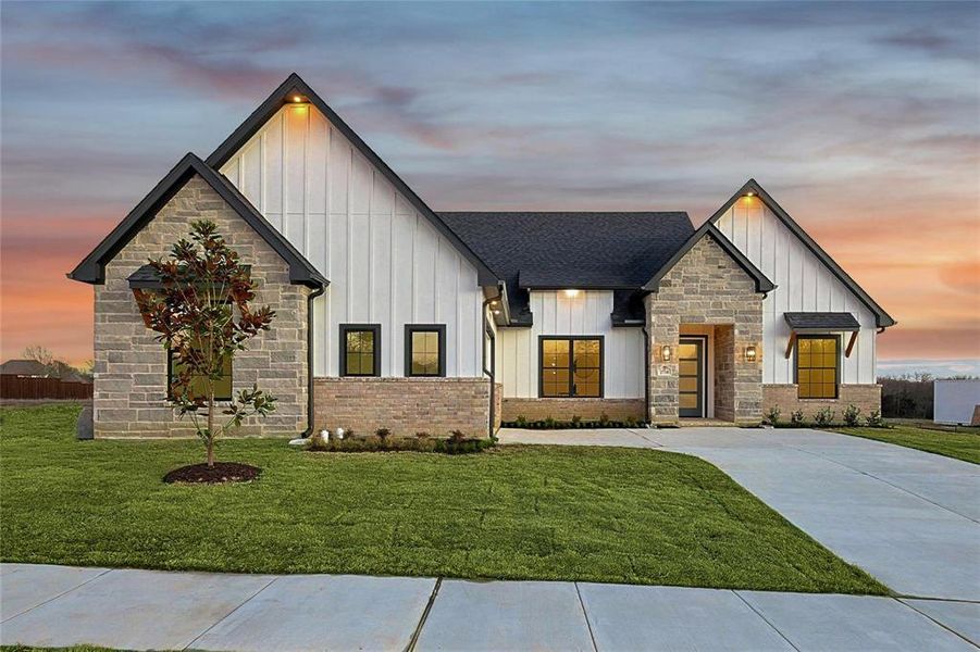Front exterior of a new home in , Sherman, TX, highlighting curb appeal (Image 1).
