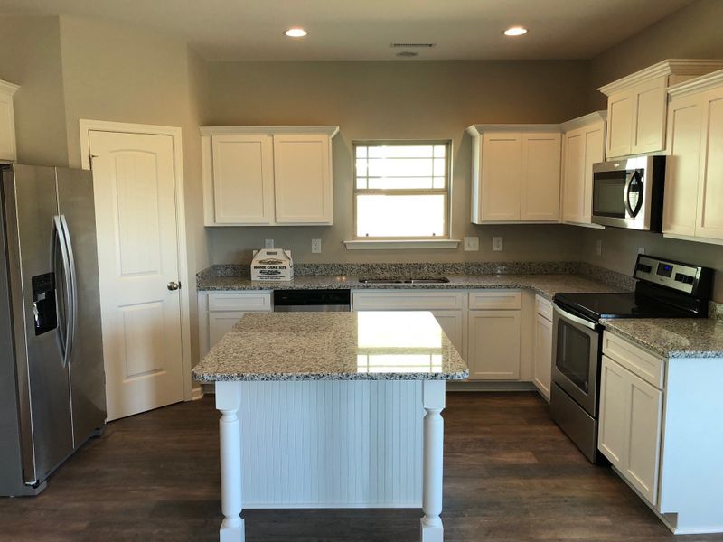 Furnished interior view inside a new home in Brandon Woods, Spring Hill (Image 3).