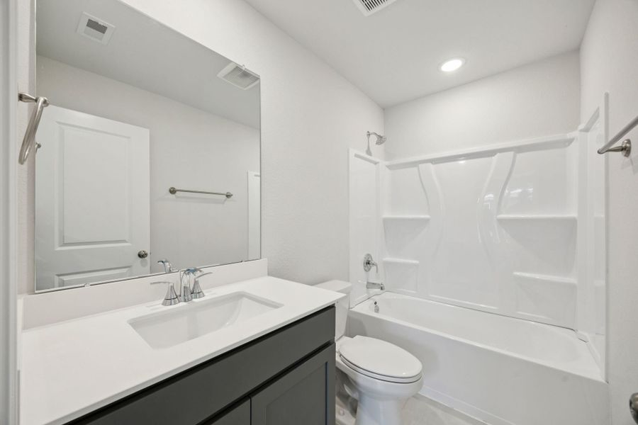 Furnished interior view inside a new home in Saint Tropez, Huffman (Image 9).