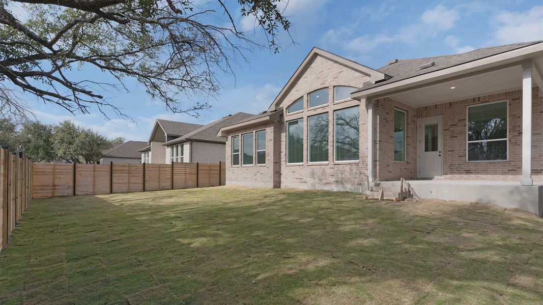 Exterior details and patio area of a home in Highland Village, Georgetown (Image 14).