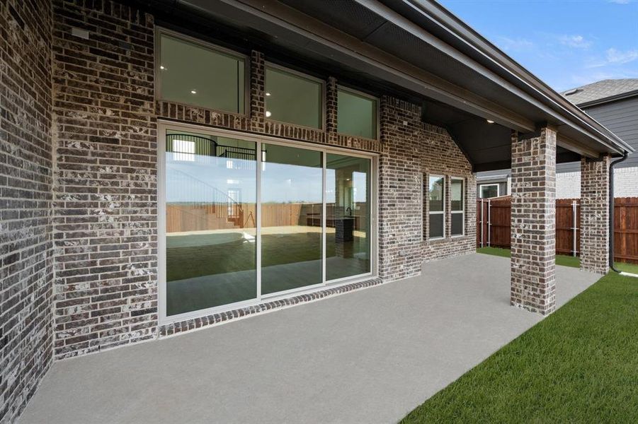 Exterior details and patio area of a home in Westside Preserve, Midlothian (Image 21).