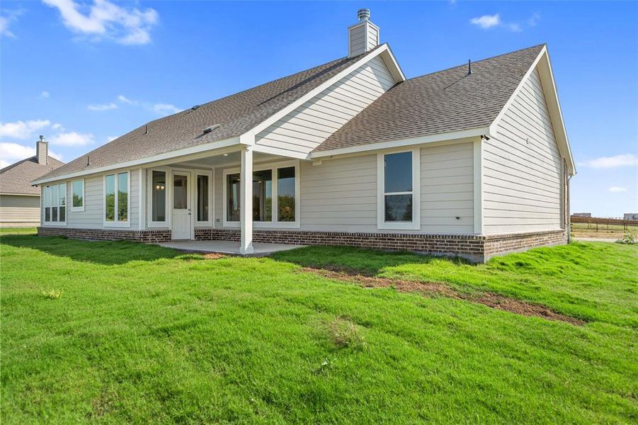Front exterior of a new home in Fairview Meadows, New Fairview, TX, highlighting curb appeal (Image 20). Front exterior of a new home in Fairview Meadows, New Fairview, TX, highlighting curb appeal (Image 20).