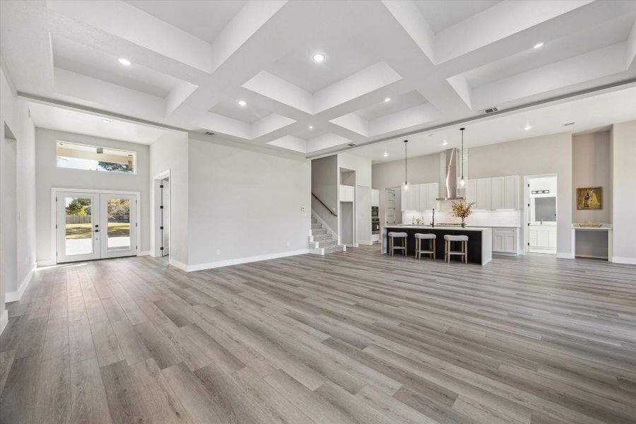 This is the view from the Fireplace looking towards the Foyer, Entry and expansive Great Room and Kitchen. Opulent Open Floor Plan provide so many selections in Design