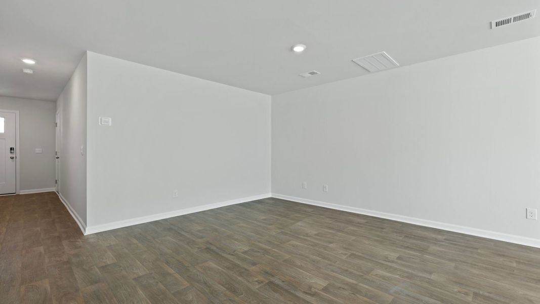 Representative unfurnished interior of a home built from the DENMARK by D.R. Horton in Pine Hills Townhomes at Cane Bay, Summerville (Image 18).