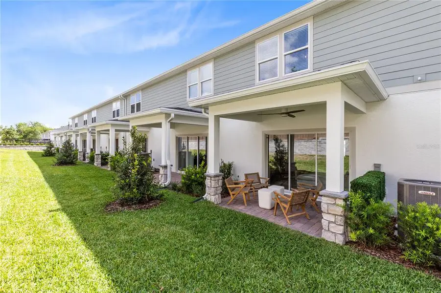 Exterior details and patio area of a home in Oviedo Square, Oviedo (Image 3).