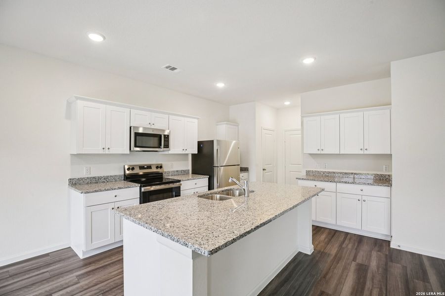 Furnished interior view inside a new home in Roosevelt Heights, San Antonio (Image 6).