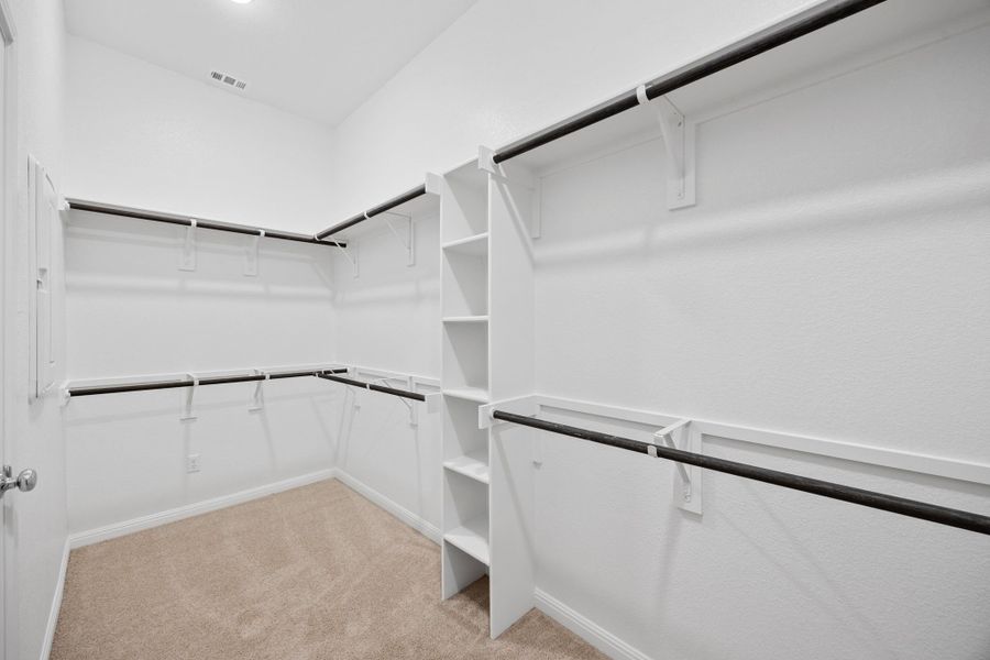 Primary Closet in the Elm home plan by Trophy Signature Homes – REPRESENTATIVE PHOTO