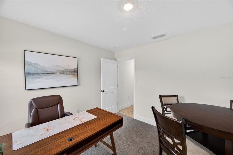 Furnished interior view inside a new home in Hill Country Estates, Dade City (Image 13).