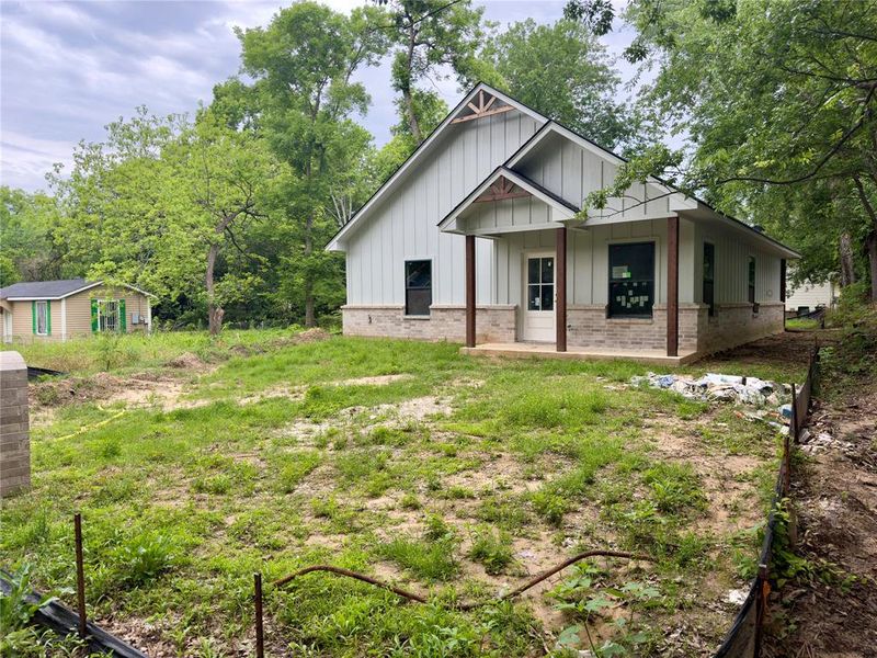 Front exterior of a new home in , Tyler, TX, highlighting curb appeal (Image 4).
