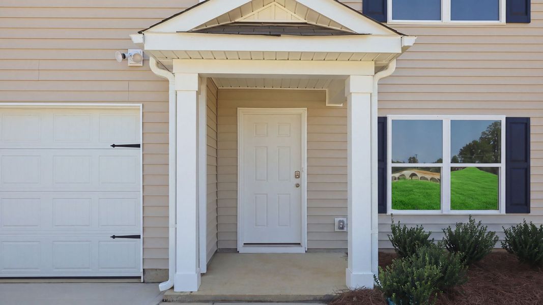 Exterior details and patio area of a home in Bynum Farms, Farmville (Image 3).