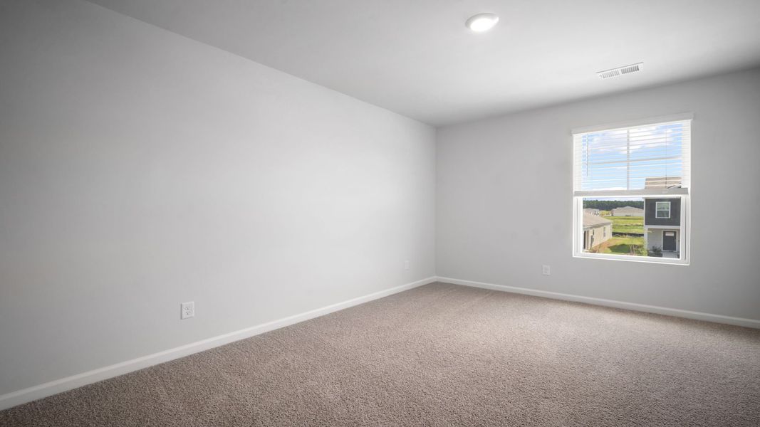 Spacious, unfurnished interior of a new home in The Lakes at North Glynn, Brunswick (Image 21).