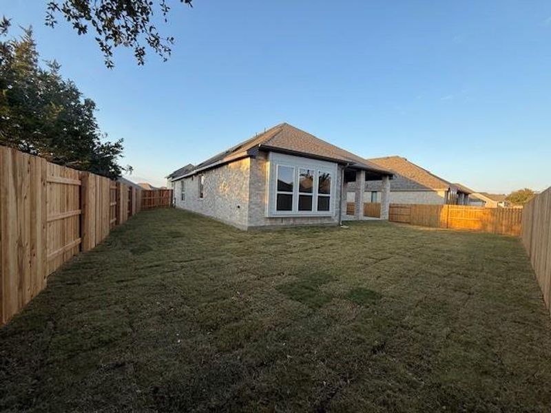 Rear of Home and Private Backyard