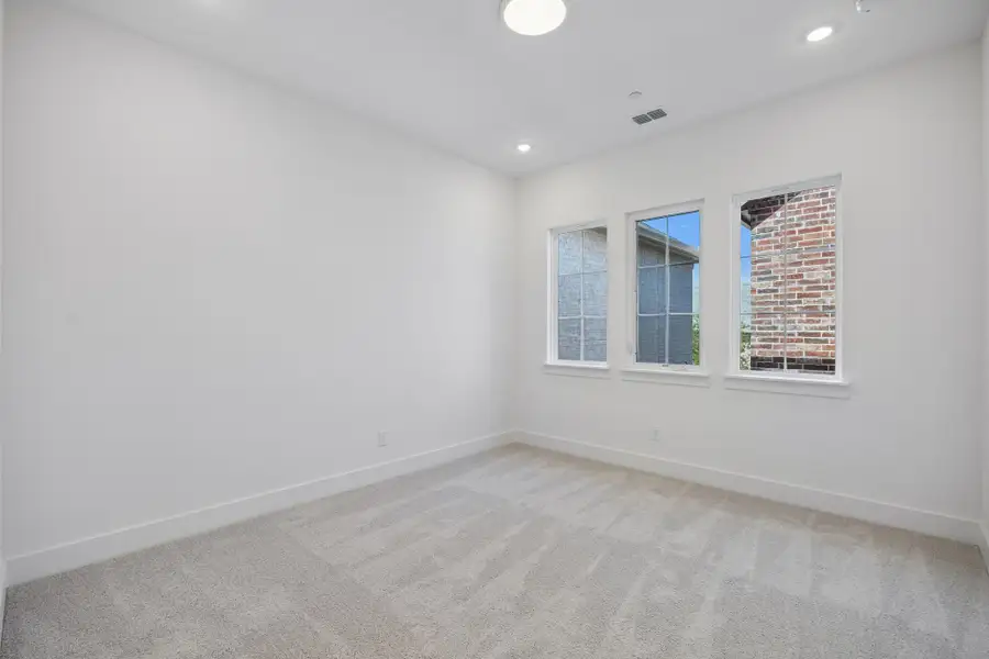Spacious, unfurnished interior of a new home in Newman Village Townhomes, Frisco (Image 30).