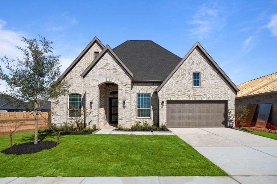 Front exterior of a new home in Attwater, Waller, TX, highlighting curb appeal (Image 19).