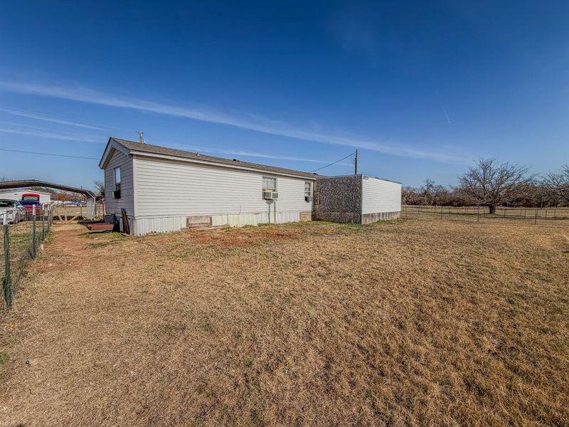 Exterior details and patio area of a home in , Weatherford (Image 20).