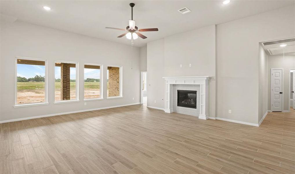 Cozy fireplace in great room (*Photo not of actual home and used for illustration purposes only.)