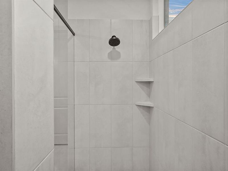 Master Bathroom Interior details featuring tiled shower