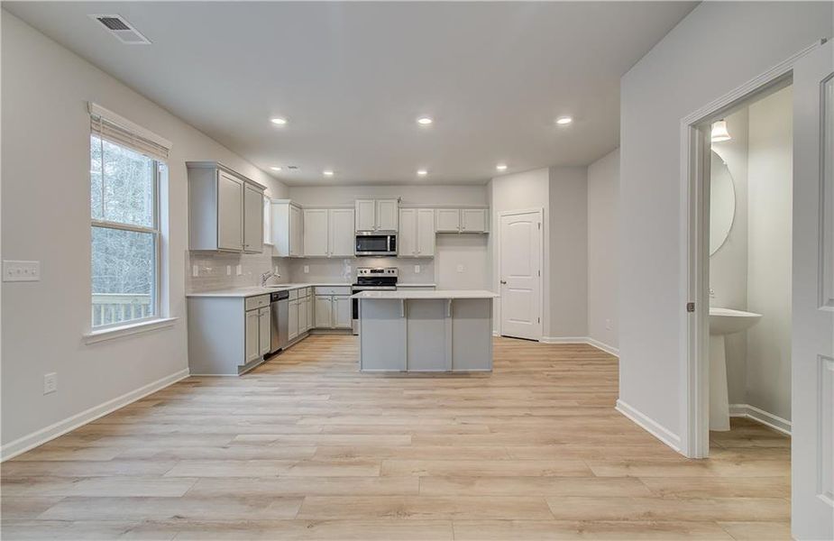 Furnished interior view inside a new home in Cedar Grove Commons, Conley (Image 4). Furnished interior view inside a new home in Cedar Grove Commons, Conley (Image 4).