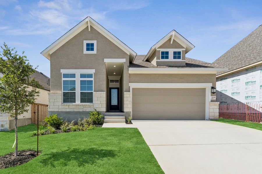 Front exterior of a new home in Ladera - High Point 45', San Antonio, TX, highlighting curb appeal (Image 1).